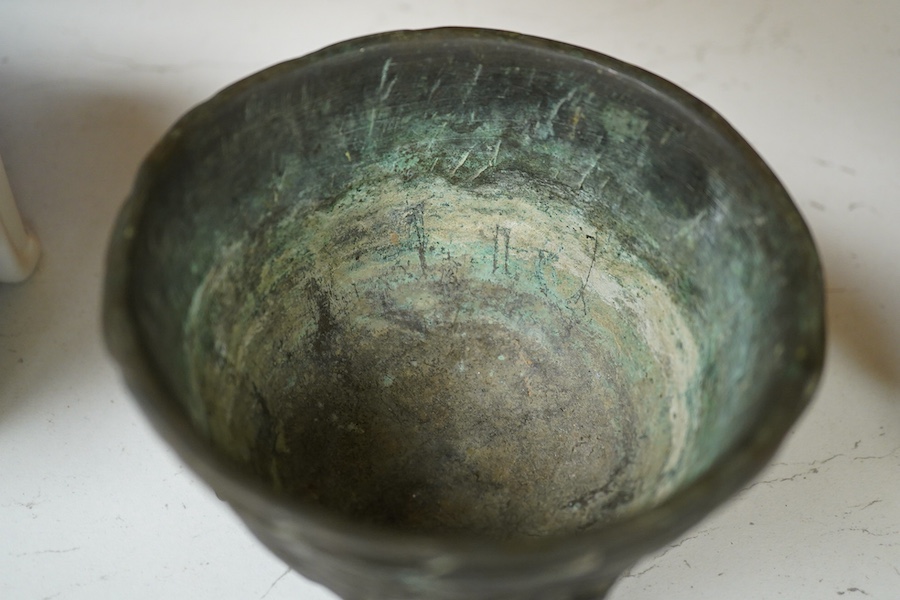 A Japanese bronze censer shaped as a basket on three legs. 8.5cm high.